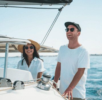 happy-caucasian-couple-standing-on-the-yacht-in-cl-2023-11-27-05-04-39-utc-1.jpg