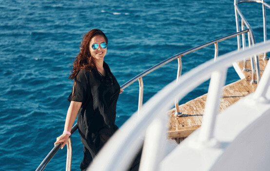 mature-woman-standing-on-the-yacht-and-enjoying-he-2023-11-27-05-20-04-utc-1.jpg